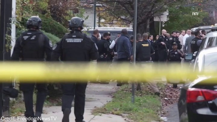 New Jersey law enforcement on the scene where multiple officers were shot by a gunman in Newark, New Jersey