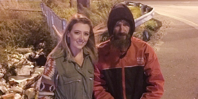 Katelyn McClure poses with Johnny Bobbitt for 2017 photo shared to GoFundMe. 