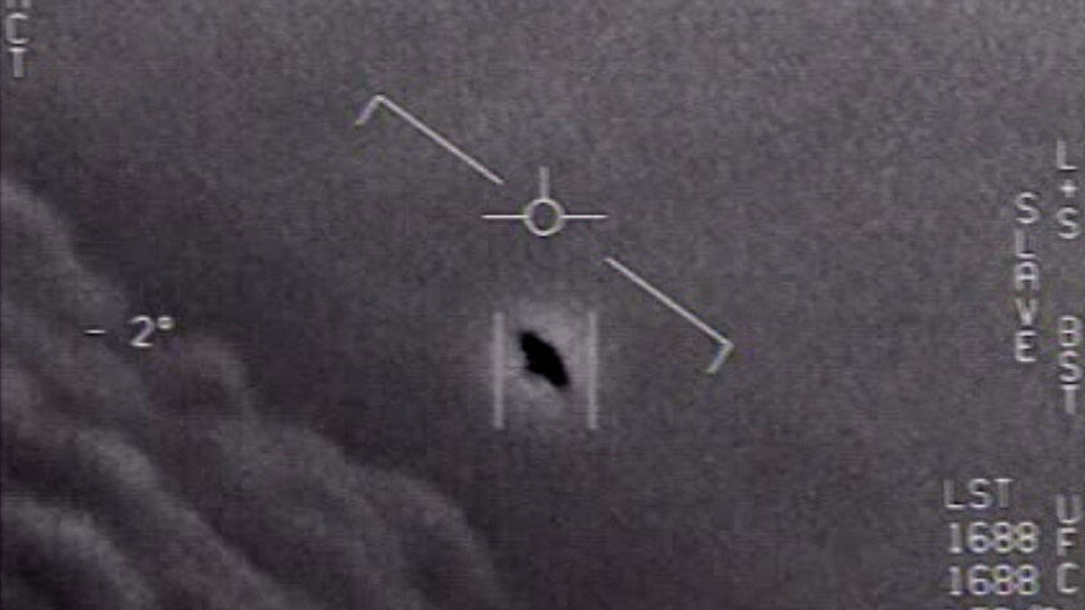 Unidentified dark object in the sky as viewed by a Navy pilot