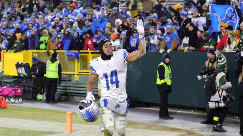 Amon-Ra St. Brown of the Detroit Lions greets fans after defeating the Green Bay Packers at Lambeau Field Sunday in Green Bay, Wisconsin. 