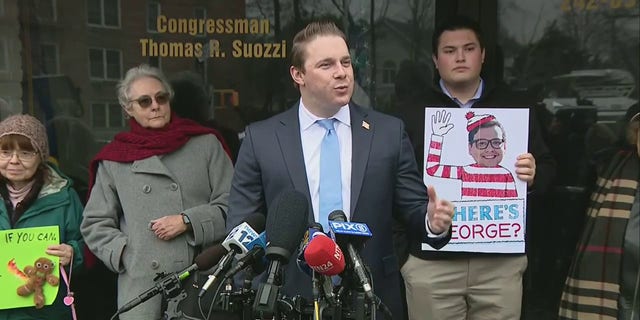 Nassau County legislator Josh Lafazan, a Democrat, led a protest outside of Rep. George Santos' Queens office on Friday, demanding that the lying congressman resign. 