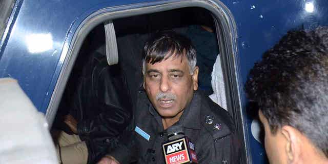 Pakistani police officer Rao Anwar responds to a reporter in Karachi, Pakistan, on Jan. 16, 2018. A Pakistani court on Jan. 23, 2023, acquitted Anwar and 17 others, mostly policemen still serving on the force, in the 2018 killing of an aspiring model.