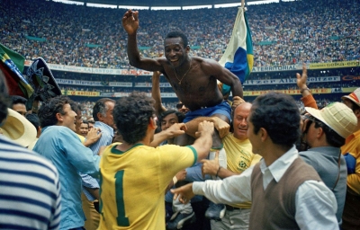 Pelé is carried off the field by fans after Brazil defeated Italy in the final of the 1970 World Cup.