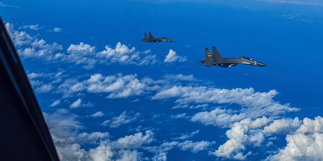 In this photo released by Xinhua News Agency, fighter jets of the Eastern Theater Command of the Chinese People's Liberation Army (PLA) conduct a joint combat training exercises around the Taiwan Island on Aug. 7, 2022.