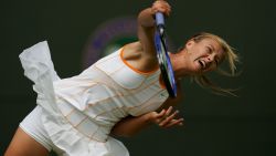 LONDON - JUNE 27:  Maria Sharapova of Russia serves against Nathalie Dechy of France during the seventh day of the Wimbledon Lawn Tennis Championship on June 27, 2005 at the All England Lawn Tennis and Croquet Club in London.  (Photo by Mike Hewitt/Getty Images)