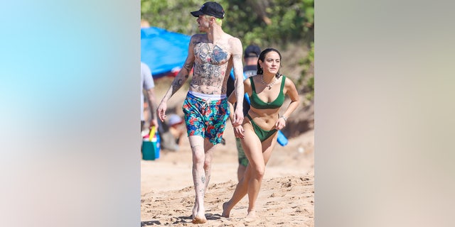 Pete Davidson and Chase Sui Wonder walked alongside one another on the beach in Hawaii.
