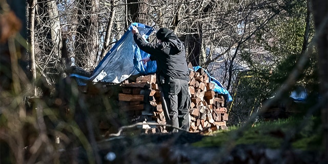 Massachusetts State Troopers and other officials searched the property, backyard, pool and surrounding area of missing woman Ana Walshe's home in Cohasset, Saturday, Jan. 7, 2023.