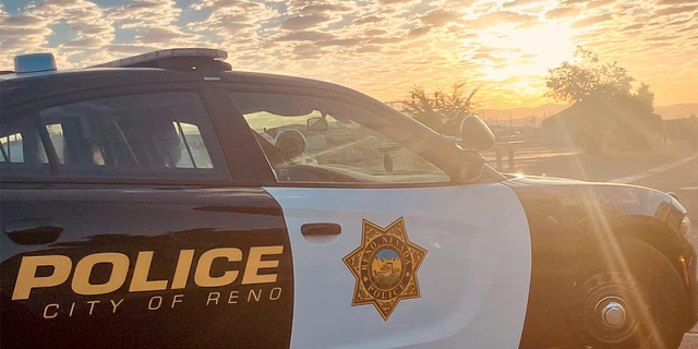 FILE- A police officer and two suspects were injured in a shooting in Reno, Nevada, on Sunday, according to officials.