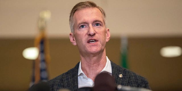 Portland Mayor Ted Wheeler spoke at City Hall in Portland, Oregon on August 30, 2020. A man had been shot and killed Saturday night as a Pro-Trump rally clashed with Black Lives Matter protesters in downtown Portland. 