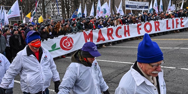 Pro-life demonstrators march up Constitution Avenue during the March for Life on Jan. 21, 2022, in Washington, D.C.