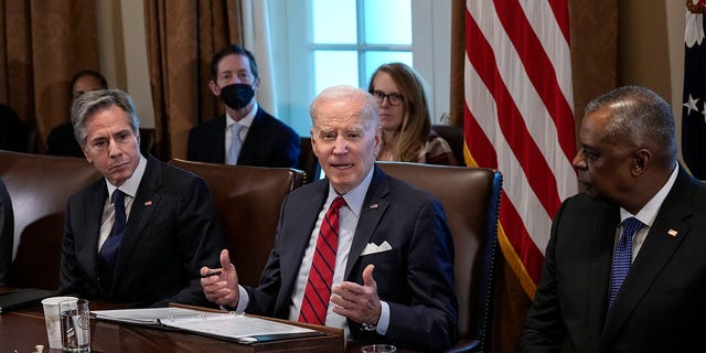 Flanked by Secretary of State Antony Blinken and Secretary of Defense Lloyd Austin, President Joe Biden speaks during a cabinet meeting in the Cabinet Room of the White House January 5, 2023, in Washington, DC. 
