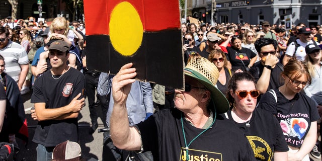 People participate in the 'Invasion Day' rally in Melbourne, January 26, 2023. 