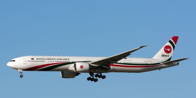 Biman Bangladesh Airlines Boeing 777-300ER landing at London Heathrow Airport. 