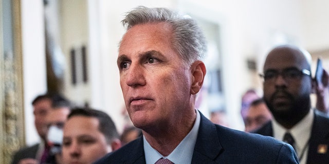 Republican Leader Kevin McCarthy, R-Calif., makes his way to the House floor before a vote for Speaker of House on Friday, January 6, 2023.