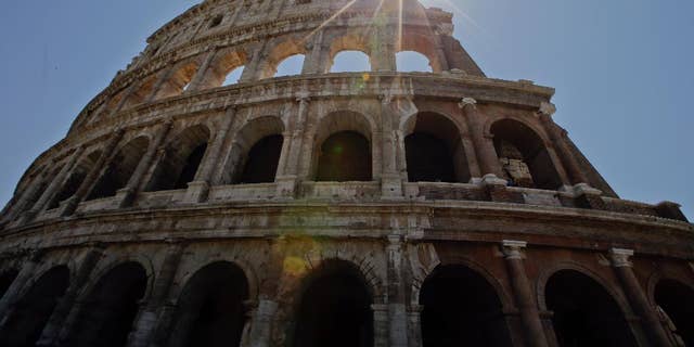 A view of the Colosseum after the first stage of the restoration work was completed in Rome, Friday, July 1, 2016.