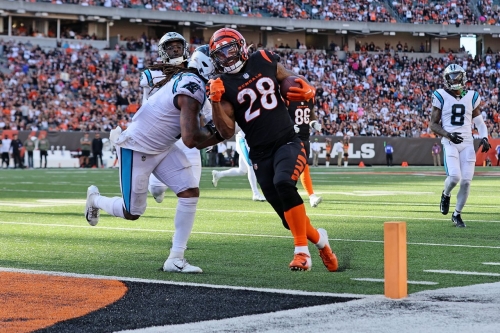 Joe Mixon scores a touchdown for the Cincinnati Bengals during the third quarter against the Carolina Panthers. Mixon scored five TDs in the 42-21 win over the Panthers, breaking the Bengals' record for the most touchdowns in a single game.