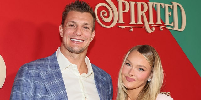 Rob Gronkowski and Camille Kostek attend Apple Original Film's "Spirited" New York Red Carpet at Alice Tully Hall, Lincoln Center, Nov. 7, 2022, in New York City. 