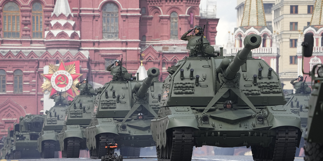 Russian self-propelled artillery vehicles roll during the Victory Day military parade in Moscow, Russia, on Monday, May 9.