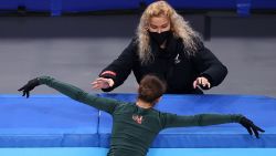 BEIJING, CHINA - FEBRUARY 13: Kamila Valieva of Team ROC or Russia skates pictured with her coach, Eteri Tutberidze during a training session on day nine of the Beijing 2022 Winter Olympic Games at Capital Indoor Stadium on February 13, 2022 in Beijing, China. (Photo by Dean Mouhtaropoulos/Getty Images)