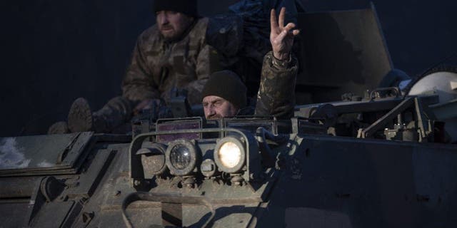 Ukrainian soldiers are seen on their ways to frontlines with their armoured military vehicles as the strikes continue on the Donbass frontline, during Russia and Ukraine war in Donetsk Oblast, Ukraine on Jan. 24, 2023. 