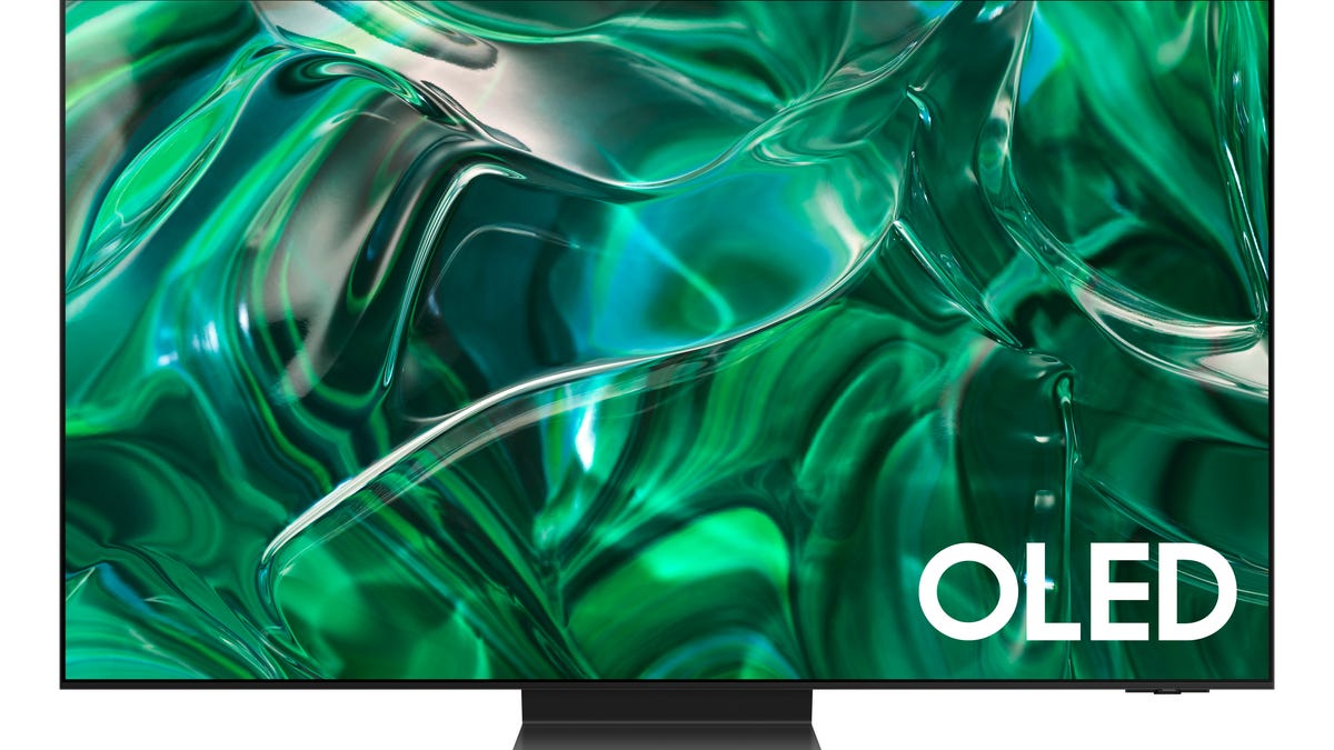 The Samsung S95C QD-OLED with a green pattern on the screen.