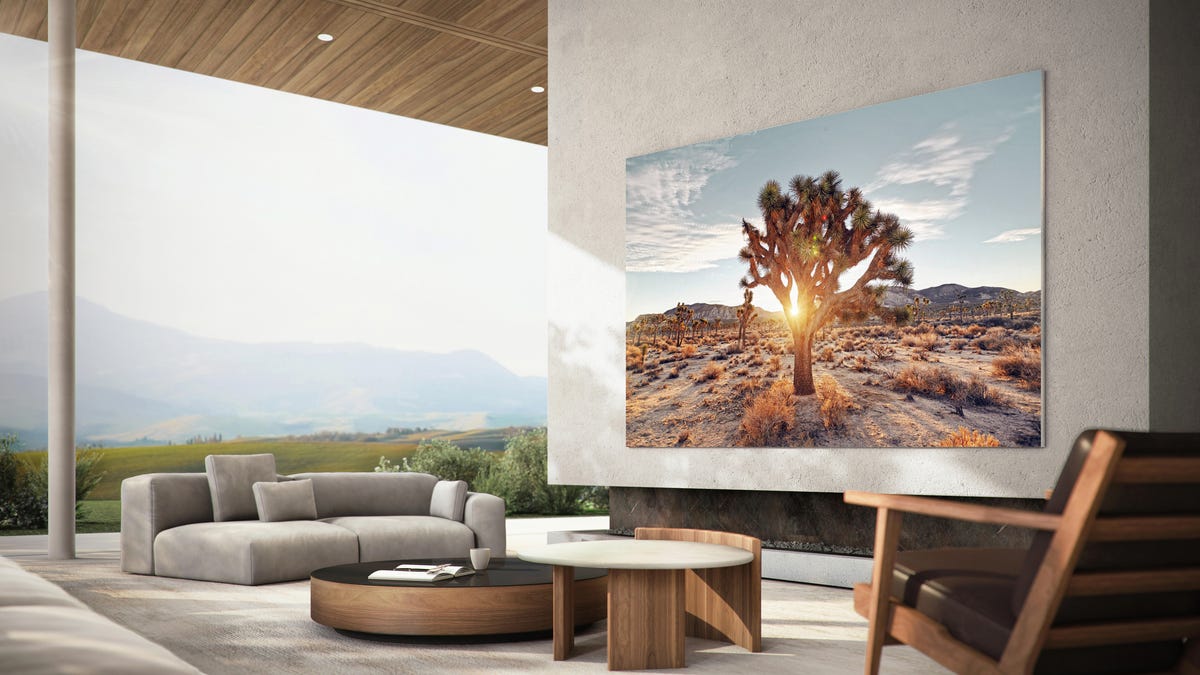 MicroLED TV by Samsung hung on the wall in an open-air seating area