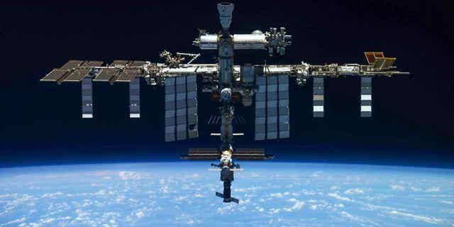 In this handout photo released by Roscosmos State Space Corporation, a view of the International Space Station taken on March 30, 2022, by crew of Russian Soyuz MS-19 space ship after undocking from the station. 