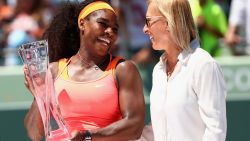 KEY BISCAYNE, FL - APRIL 04:  Serena Williams of the United States shares a joke with Martina Navratilova of the United States as she holds the Butch Bucholz Trophy after her straight sets victory against Carla Suarez Navarro of Spain in the final during the Miami Open Presented by Itau at Crandon Park Tennis Center on April 4, 2015 in Key Biscayne, Florida.  (Photo by Clive Brunskill/Getty Images)