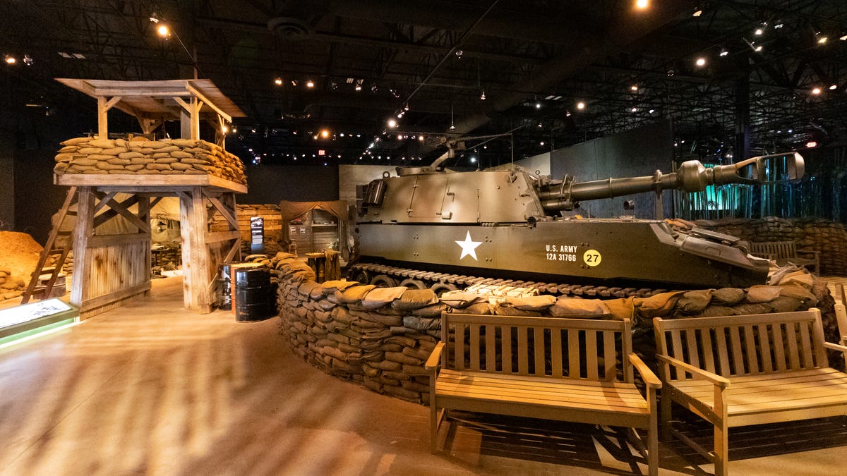 A Cold War-era mobile artillery next to a watchtower inside the National Museum of Military Vehicles.