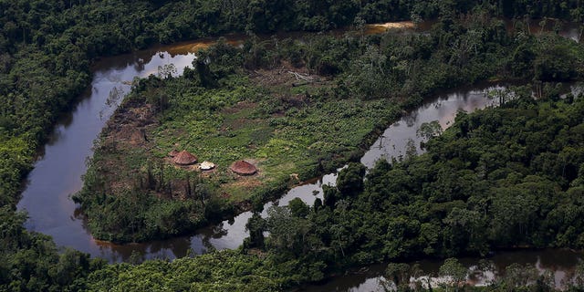 A village of indigenous Yanomami is seen during an environmental operation against illegal gold mining on indigenous land, in Roraima state, Brazil, on April 18, 2016.
