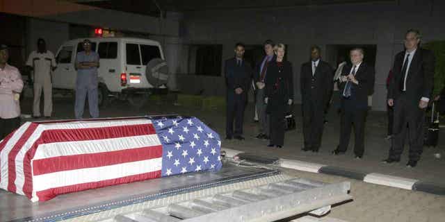 The coffin of John Granville, 33, who worked for the U.S. Agency for International Development, is received by U.S. officials in Khartoum, Sudan, on Jan. 3, 2008. Sudanese authorities have released a man convicted of the 2008 killing of John Granville.