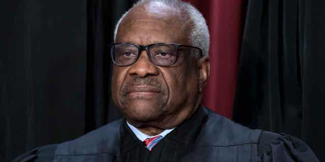 Associate Justice Clarence Thomas is one of three current U.S. Supreme Court justices who has expressed openness to revisiting the 1977 Trans World Airlines v. Hardison decision, which created an "undue burden" standard for employer religious discrimination claims. (AP Photo/J. Scott Applewhite, File)