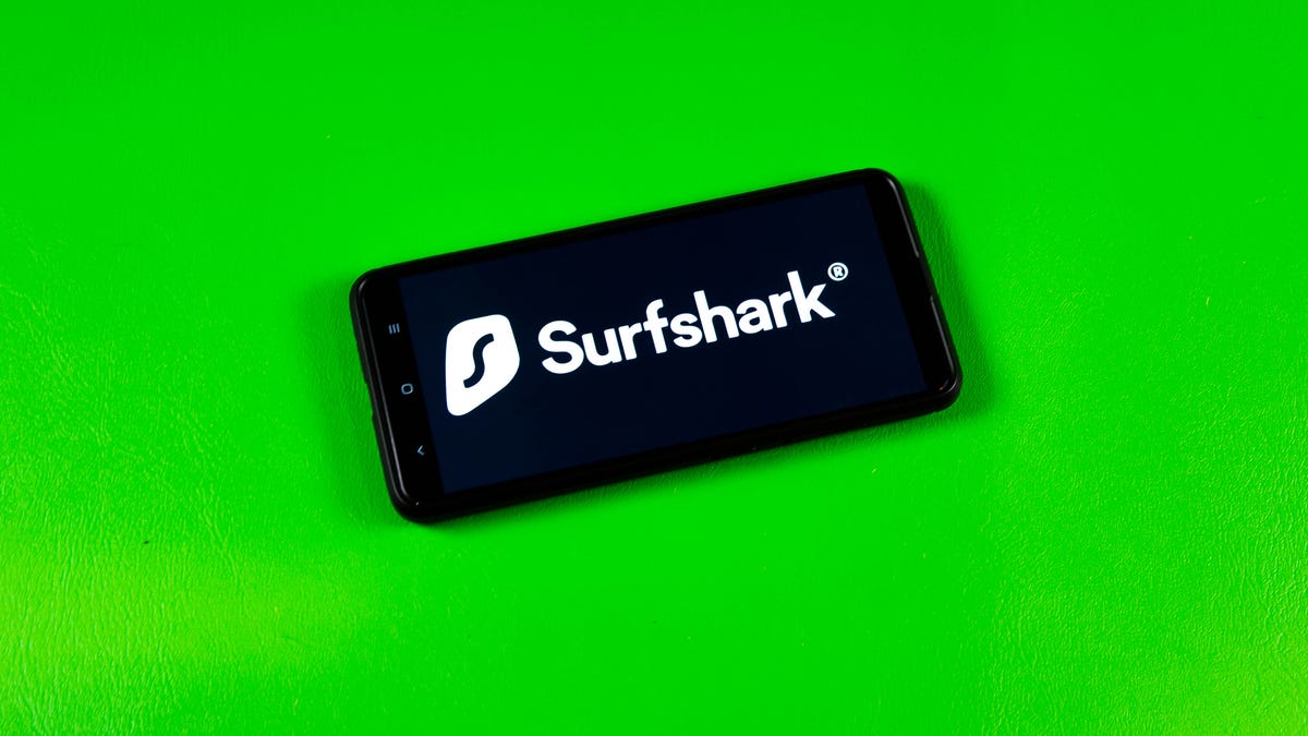 Surfshark logo on phone