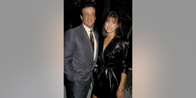 Sylvester Stallone and Jennifer Flavin are shown in 1990.