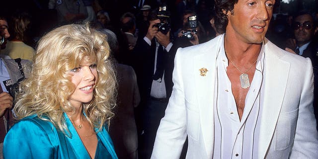 Sasha Czack and Sylvester Stallone attend a premiere together.