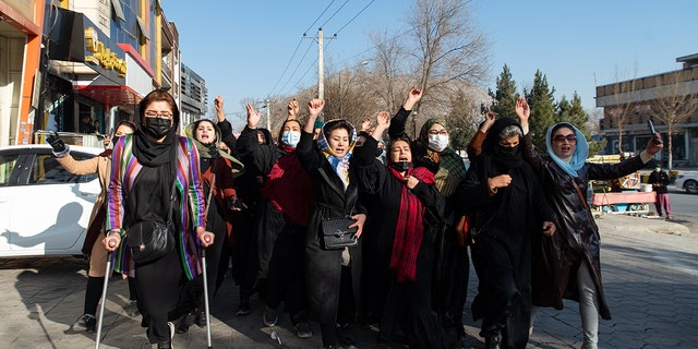 KABUL, AFGHANISTAN - DECEMBER 22:  Afghan women protest against new Taliban ban on women accessing University Education on December 22, 2022 in Kabul, Afghanistan.