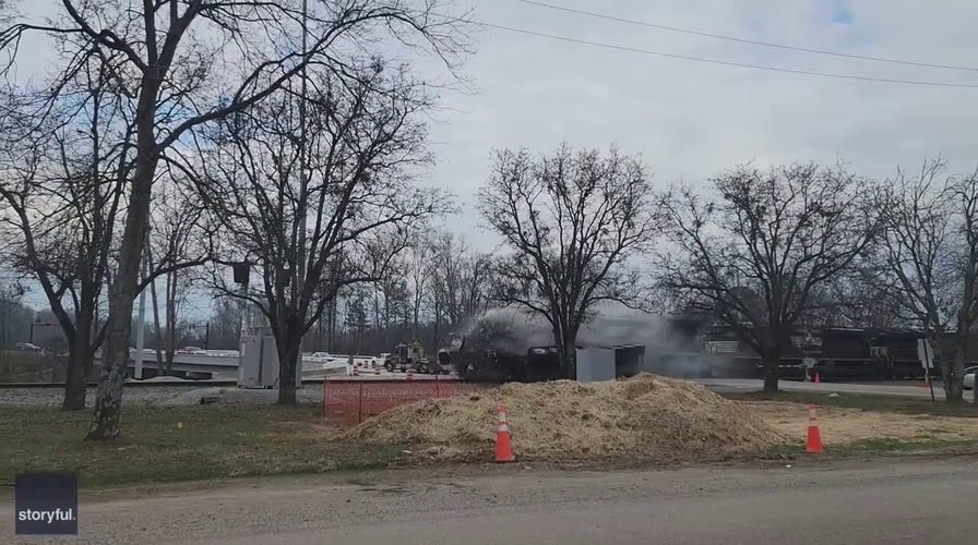 Train in Tennessee slams into truck carrying concrete beam, derails