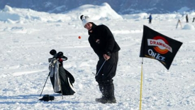 Jack O'Keefe of USA in action during the 2002 Drambuie World Ice Golf Championships in Uummannaq, Greenland.