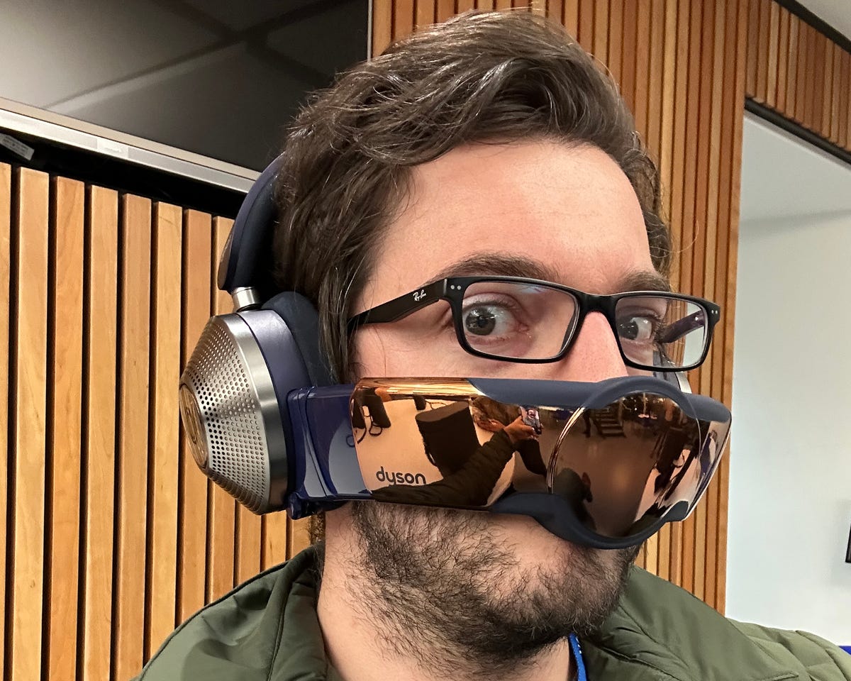Man wearing headphones and visor