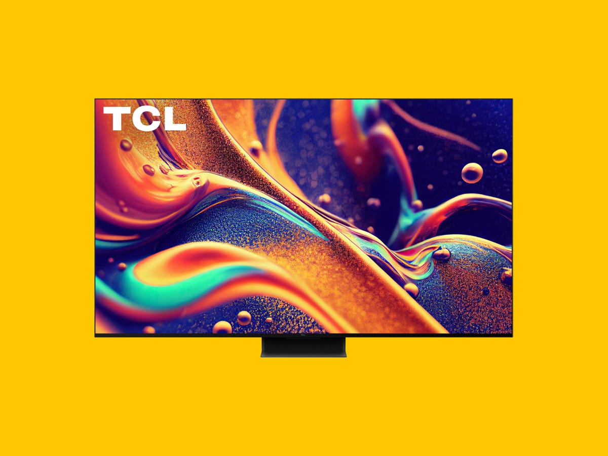 A TCL television placed on a yellow background