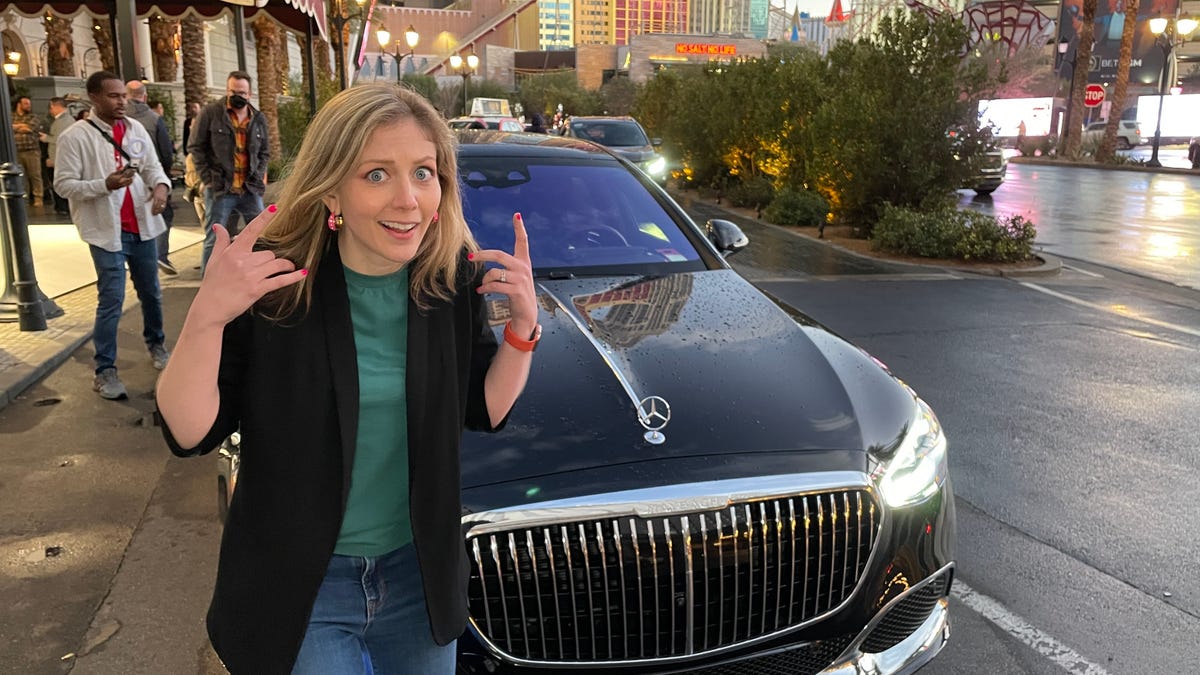 Bridget Carey in front of a Mercedes-Maybach car