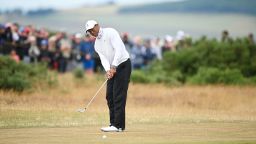 ST ANDREWS, SCOTLAND - JULY 15: Tiger Woods of the United States plays a shot on the ninth hole during Day Two of The 150th Open at St Andrews Old Course on July 15, 2022 in St Andrews, Scotland. (Photo by Stuart Franklin/R&A/R&A via Getty Images)