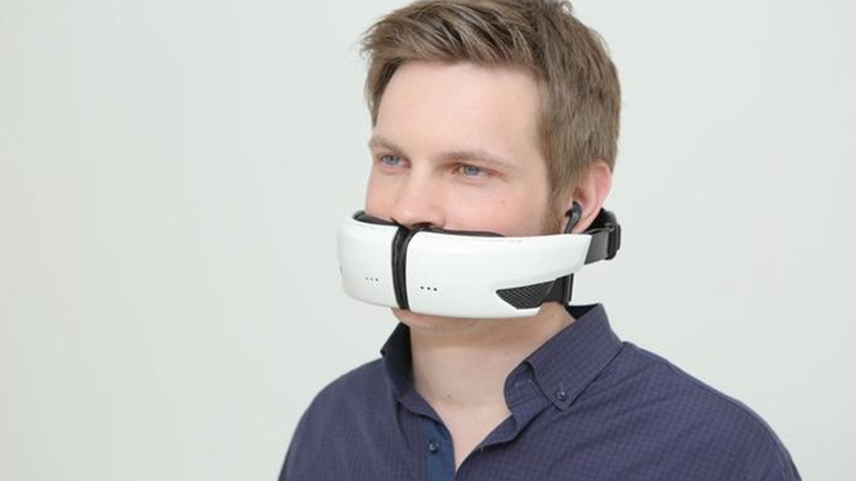Hushme voice mask, which looks like headphones worn with the band across the mouth