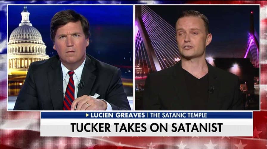 'You're Just a Troll': Tucker Takes on Satanist