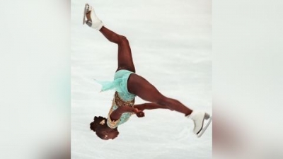 Surya Bonaly of France performs a backflip in her free skate routine in the women's Olympic figure skating in Nagano on February 20, 1998.