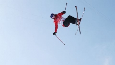 Eileen Gu performs a trick during the women's freestyle freeski halfpipe final at the Beijing Winter Olympics in February.