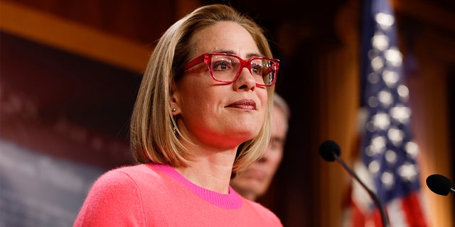 Sen. Kyrsten Sinema, D-Ariz., speaks at a news conference after the Senate passed the Respect for Marriage Act at the Capitol Building on Nov. 29, 2022, in Washington, D.C.
