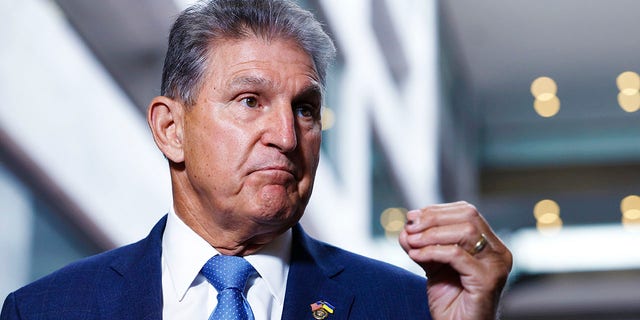 Sen. Joe Manchin (D-WV) gestures as he speaks to reporters in the Hart Senate Office building on August 01, 2022, in Washington, DC.  (Photo by Anna Moneymaker/Getty Images)