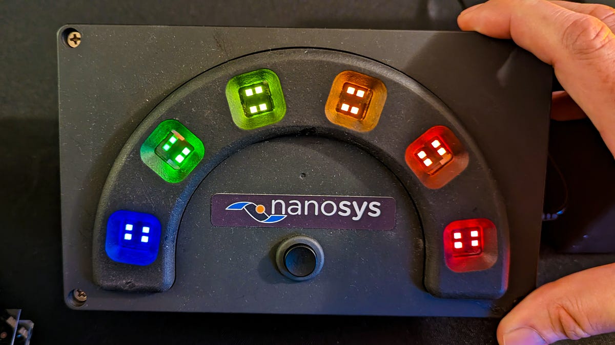 A hand-built box showing a rainbow of pixels lit by electroluminescent quantum dots.