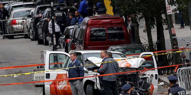 New York suffered its worst terror attack since 9/11 on Halloween of 2017 when a driver plowed a rental truck into pedestrians and bikers on the West Side Highway, killing 8 people. Police here investigate the pickup truck used in the attack.